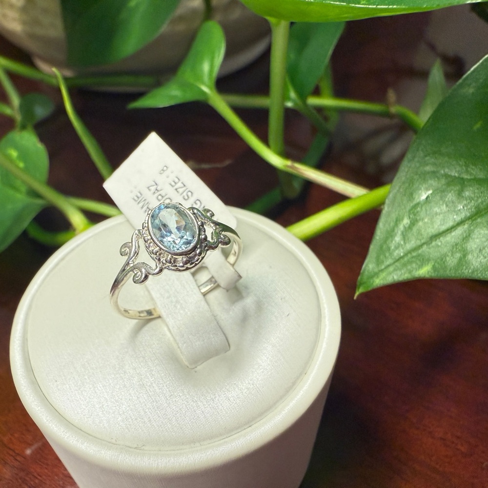 Elegant Silver Ring with Blue Topaz